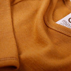 Müsli Woolly meriinovillane body pv, wood