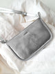 Treats Emilia, väike naturaalsest nahast crossbody-kott - Silver