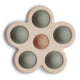 Mushie pop-it mänguasi lilleke, Dried Thyme/Natural/Shifting Sand