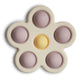 Mushie pop-it mänguasi lilleke, Soft Lilac/Daffodil/Ivory