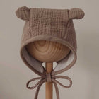 MiniMilla musliinkangast beebimüts, beige bear