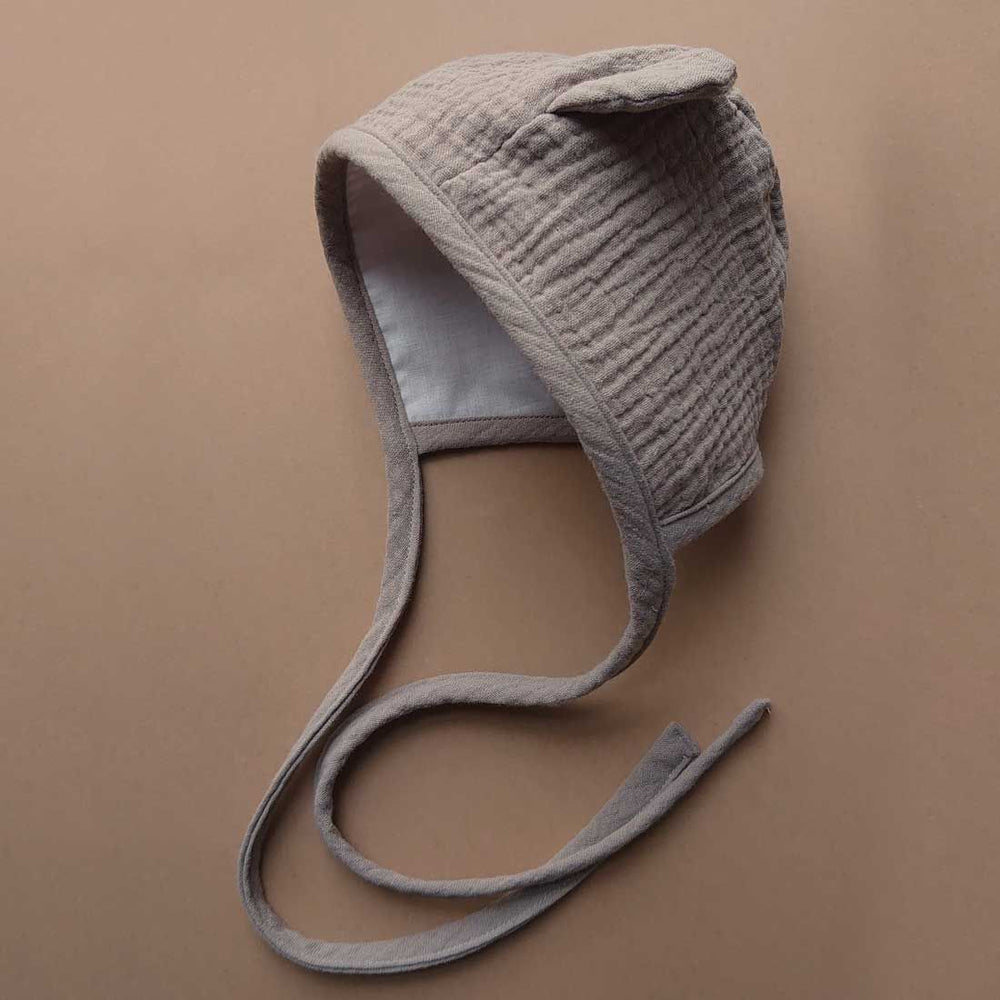 MiniMilla musliinkangast beebimüts, beige bear