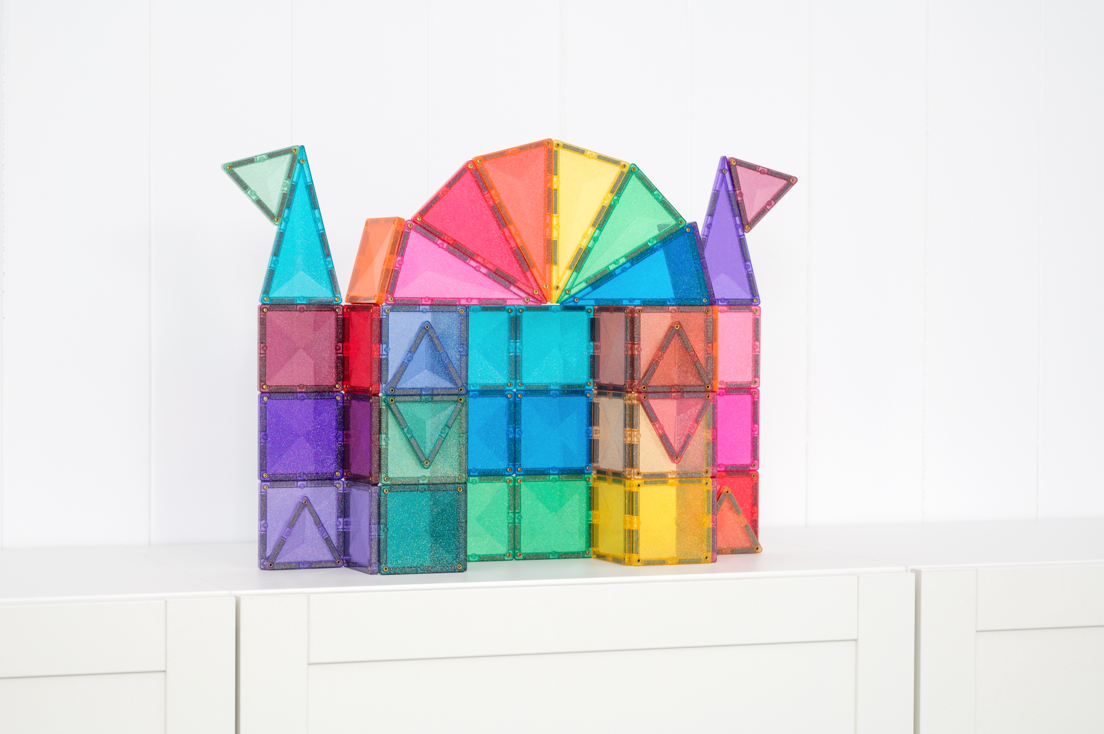 Connetix Glitter Castle Pack 48 pc, sädelevad magnetklotsid ✨ Connetix Glitter Castle Pack 48 pc, sädelevad magnetklotsid ✨ CONNETIX magnetklotsid - HellyK - Kvaliteetsed lasteriided, villariided, barefoot jalatsid