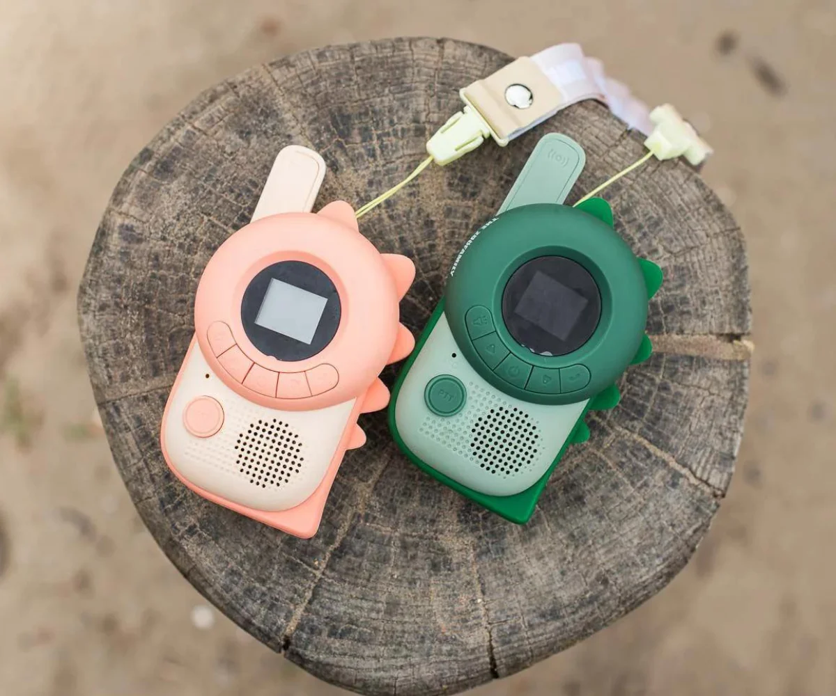 The Zoofamily Walkie Talkie, dino roosa-dino roheline The Zoofamily Walkie Talkie, dino roosa-dino roheline Mänguasjad - HellyK - Kvaliteetsed lasteriided, villariided, barefoot jalatsid