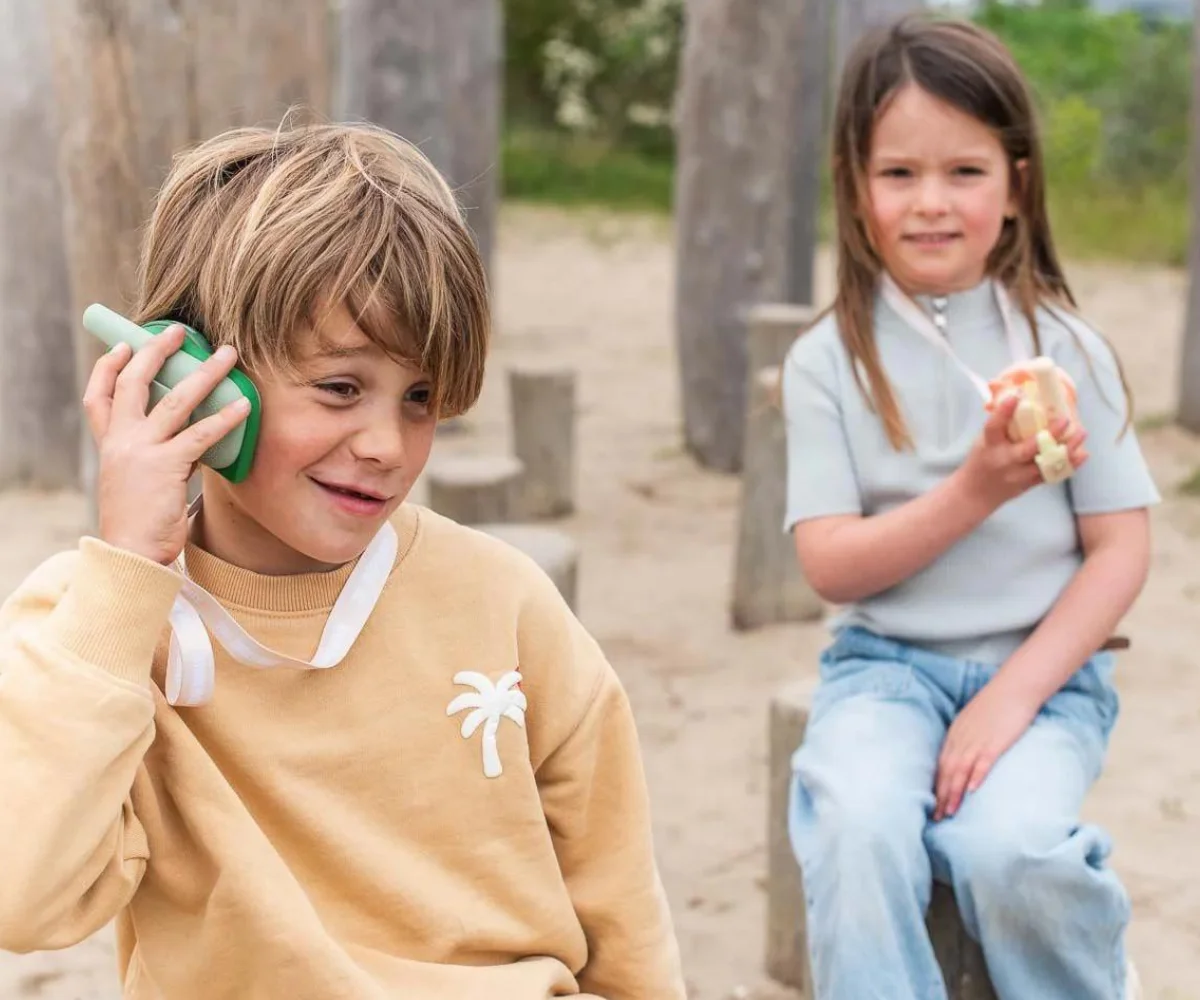 The Zoofamily Walkie Talkie, dino roosa-dino roheline The Zoofamily Walkie Talkie, dino roosa-dino roheline Mänguasjad - HellyK - Kvaliteetsed lasteriided, villariided, barefoot jalatsid