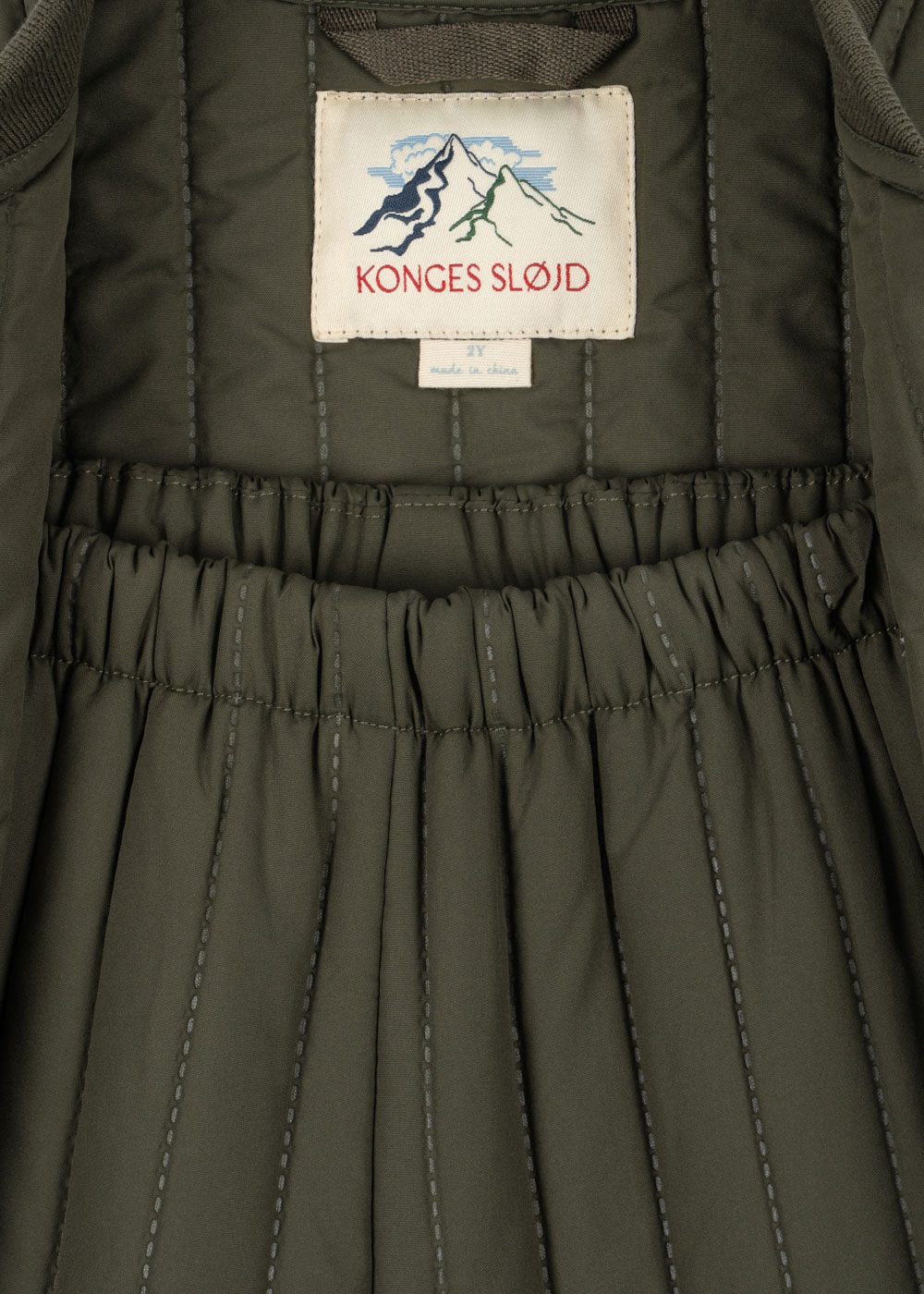 Konges Slojd Evi termokomplekt, kalamata/SS’26 Konges Slojd Evi termokomplekt, kalamata/SS’26 Lasteriided - HellyK - Kvaliteetsed lasteriided, villariided, barefoot jalatsid